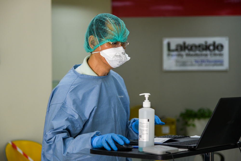 Mr Tan also served at Lakeside Family Medicine Clinic (LFMC) as a frontline worker when there was a shortage of manpower during the Omicron outbreak. (Photo by Chan May Ching)